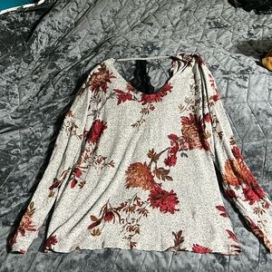 Open-Back Floral Top with lace detail.